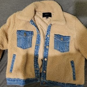 Teddy bear and denim jacket